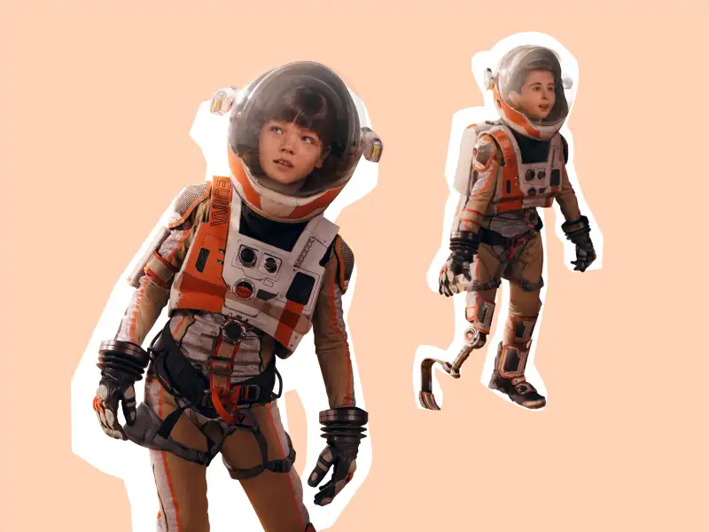Zwei Kinder in Astronautenanzügen. Ein Kind hat eine Beinprothese.