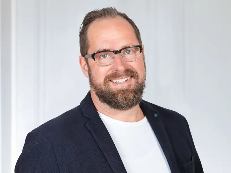 Porträtfoto von Thomas Kruse.