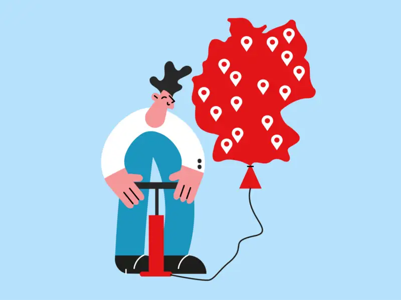 Illustration: eine Person pumpt mit einer Fußluftpumpe einen Ballon auf. Der Ballon hat die Form von Deutschland.