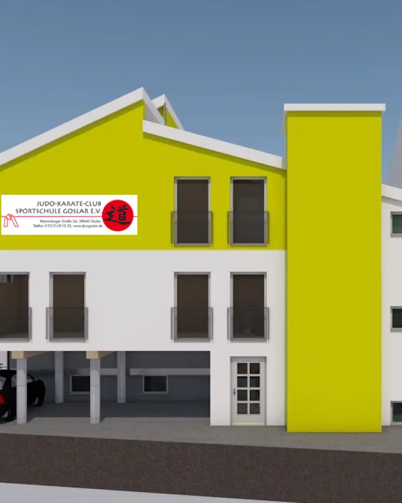 Eine Grafik zeigt ein Gebäude mit drei Etagen, neun Fenstern und einem turmartigen Vorbau. Im Untergeschoss gibt es einige Autostellplätze. Auf dem Gebäude steht: Judo-Karate-Club Sportschule Goslar E.V.