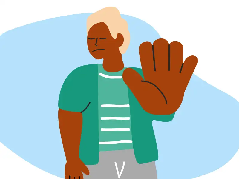 Eine Person, die eine ihrer Hände flach nach vorn vor den Körper ausstreckt. Sie signalisiert "Stop".