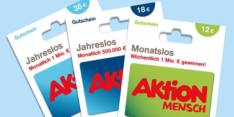 Drei Losgutscheine der Aktion Mensch-Lotterie