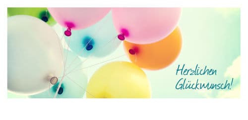Herzlichen Glückwunsch mit bunten Luftballons