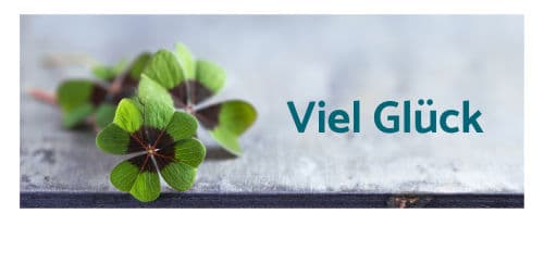 Kleeblätter mit Schriftzug: Viel Glück