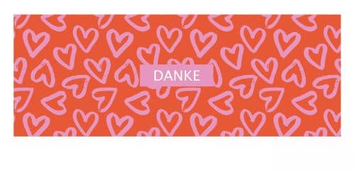 DANKE mit Herzen im Hintergrund